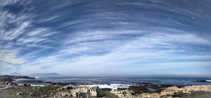 Figure 1: Panoramic view from a winter run in Betty’s Bay. I was hoping Google Photos would stitch the pretty clouds together, and it did.